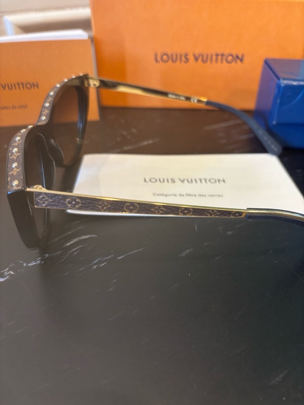 Louis Vuitton brown cat-eye sunglasses with gold stud accents. - Picture 11 of 12
